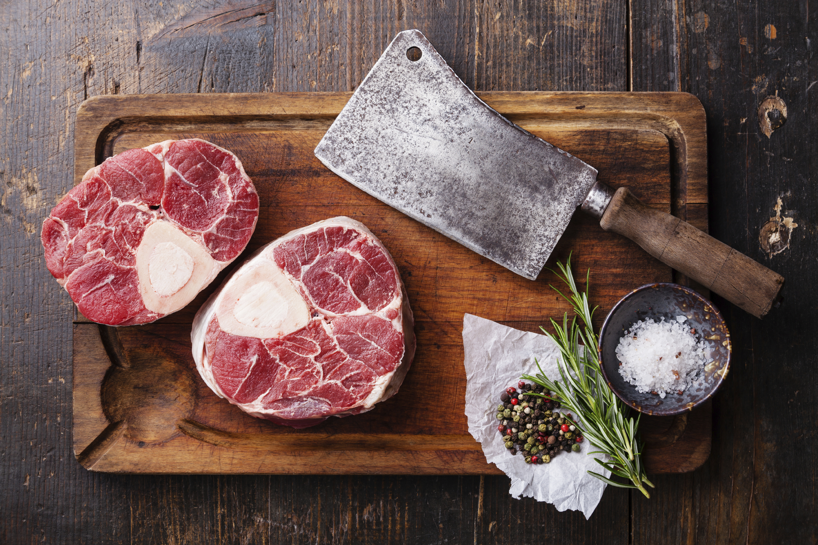 Raw fresh cross cut veal shank and seasonings for making Osso Bu - Butchers  Market