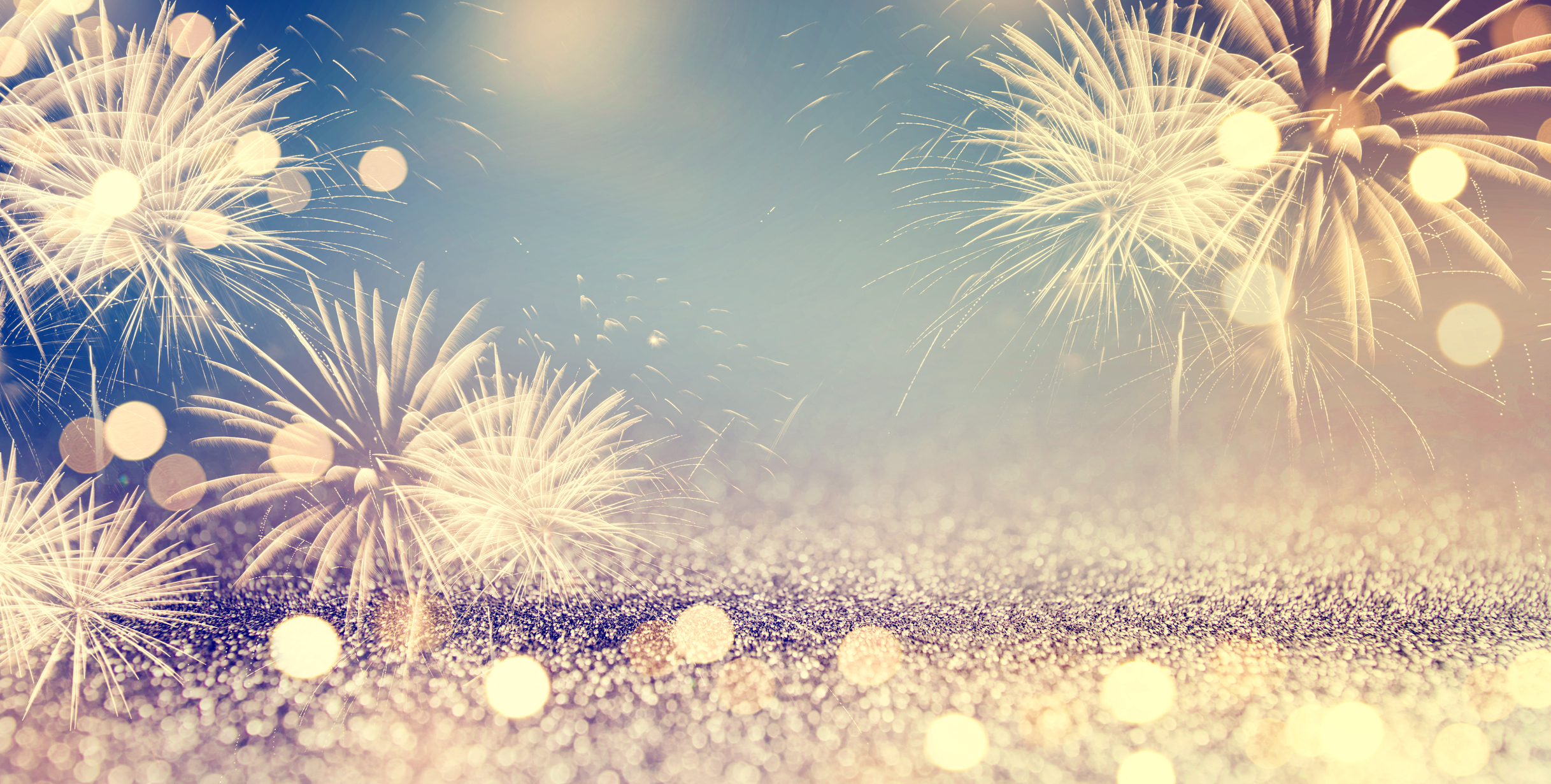 Fireworks and bokeh in New Year eve and space for text ...